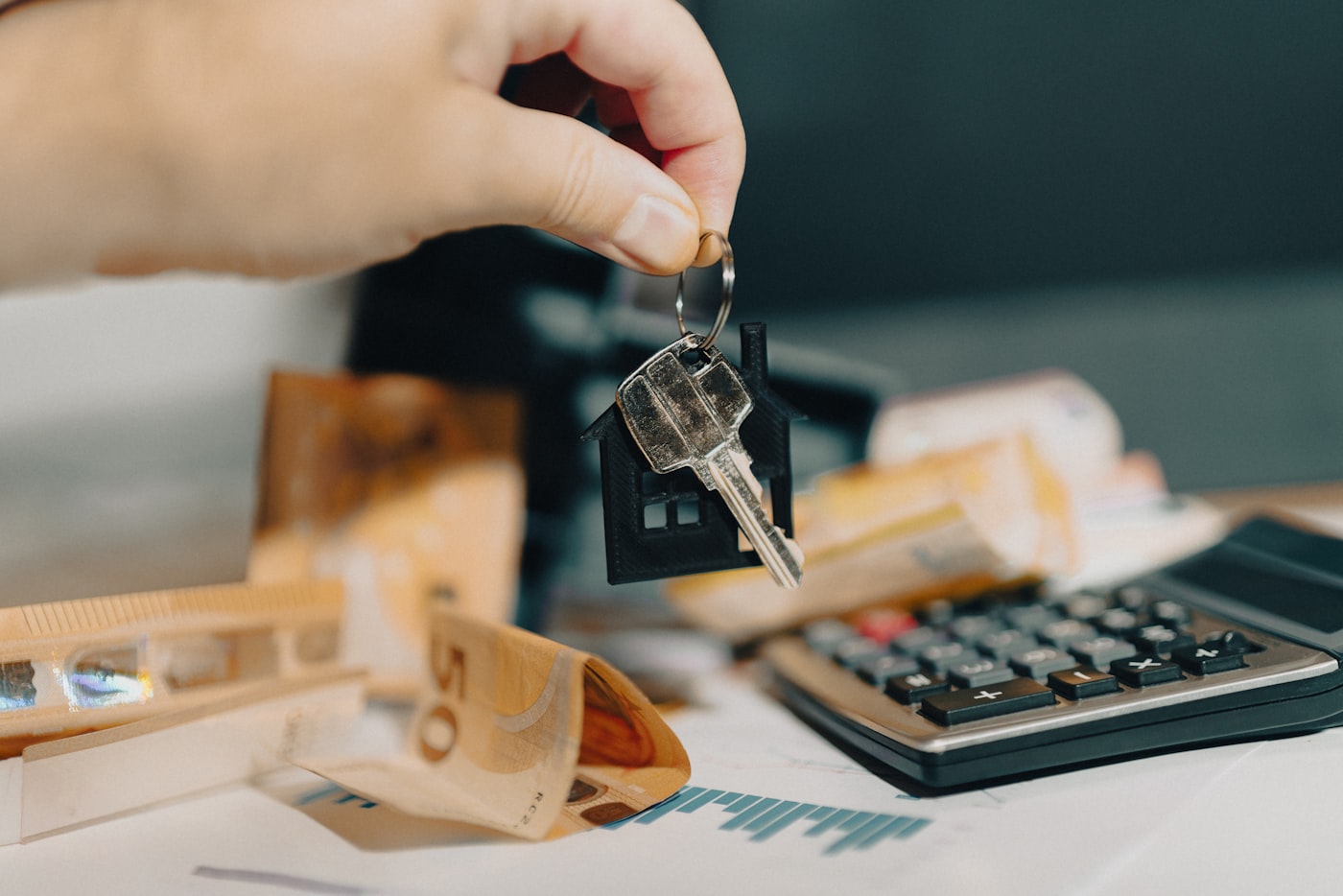 Simulação de título de capitalização para aluguel com calculadora e chave